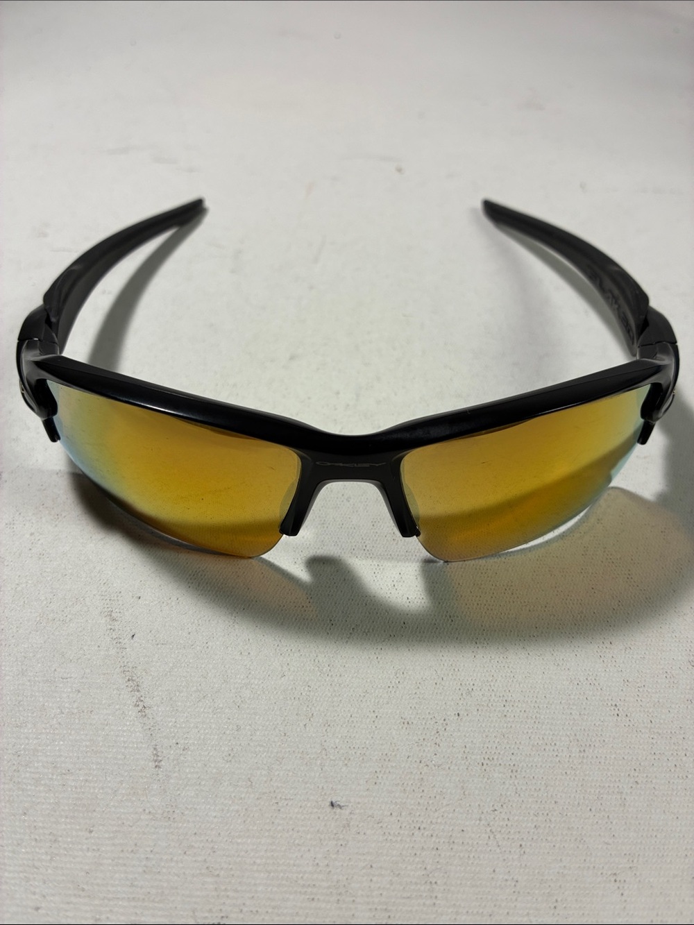 Oakley Black Frame Sunglasses with Yellow Mirrored Lenses